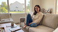 files/Woman_sitting_on_sofa_indoors_202608311222.jpg
